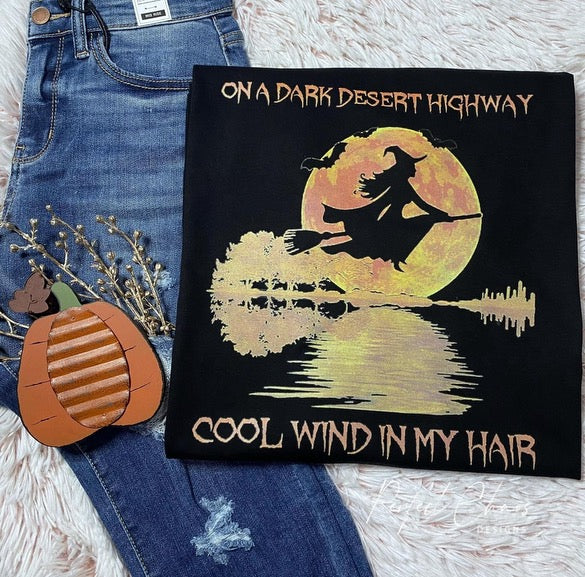 On a dark desert highway cool wind in my hair